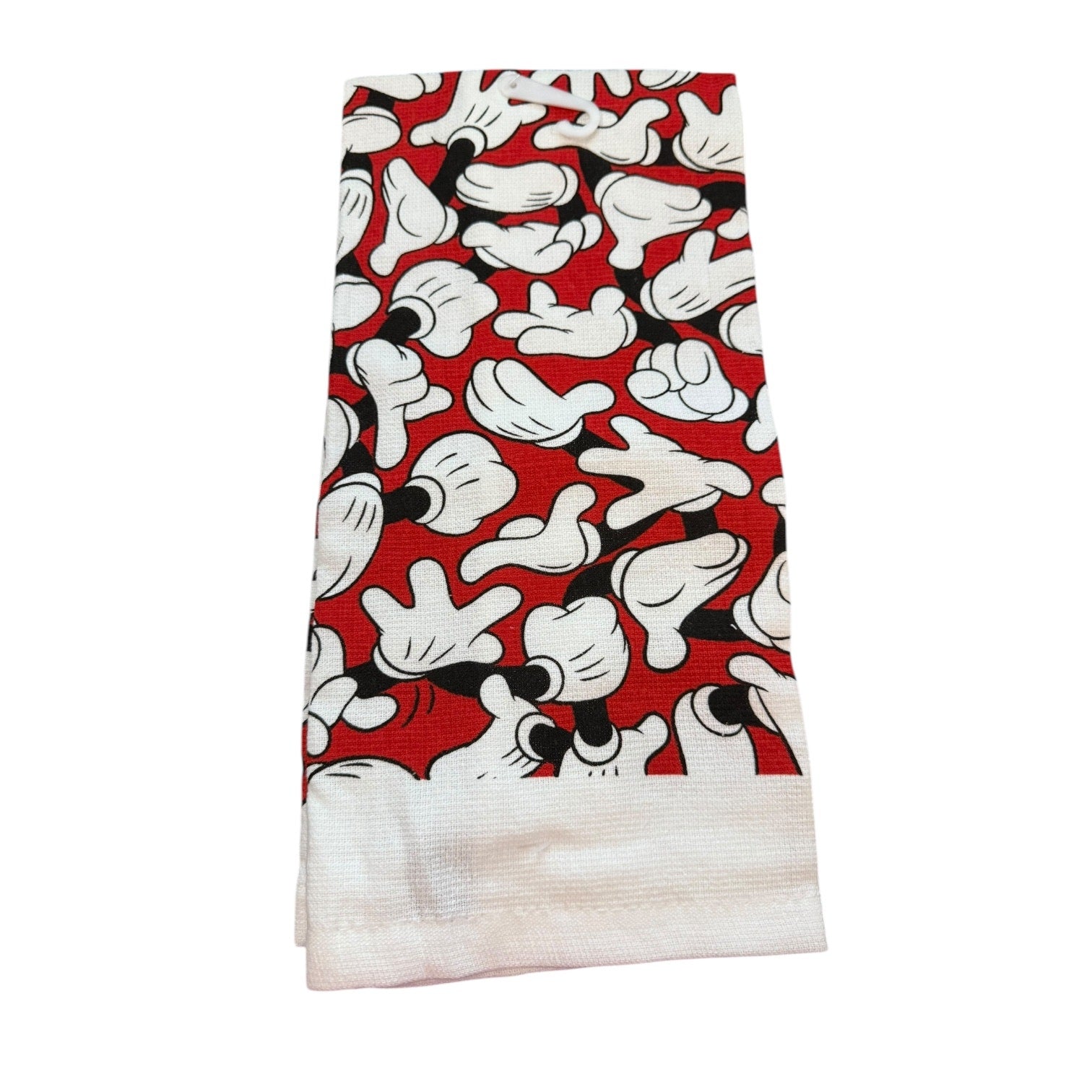 Towel with cartoon hand prints on a red background