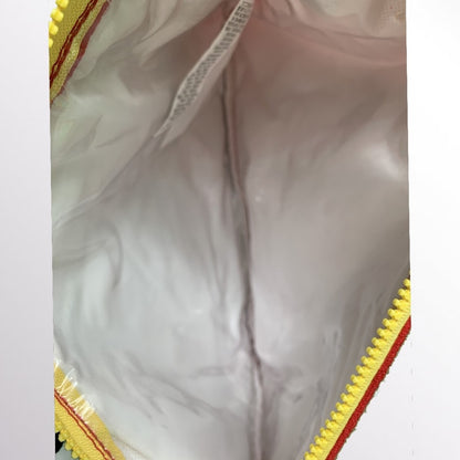 Interior of red pouch with yellow zipper and red trim on a white background