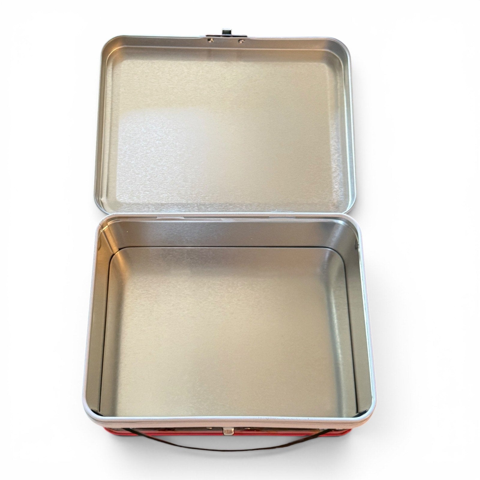 Metallic rectangular box with a lid on a white background