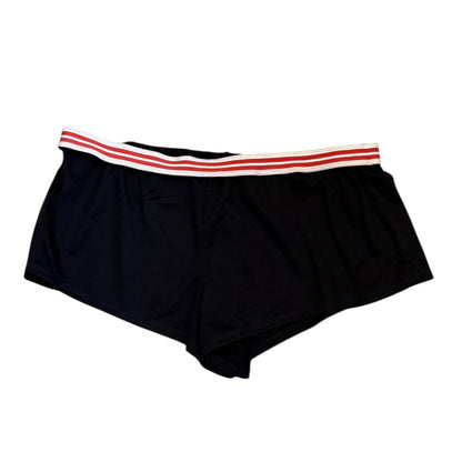 Black pajama shorts with a red and white striped waistband on a white background