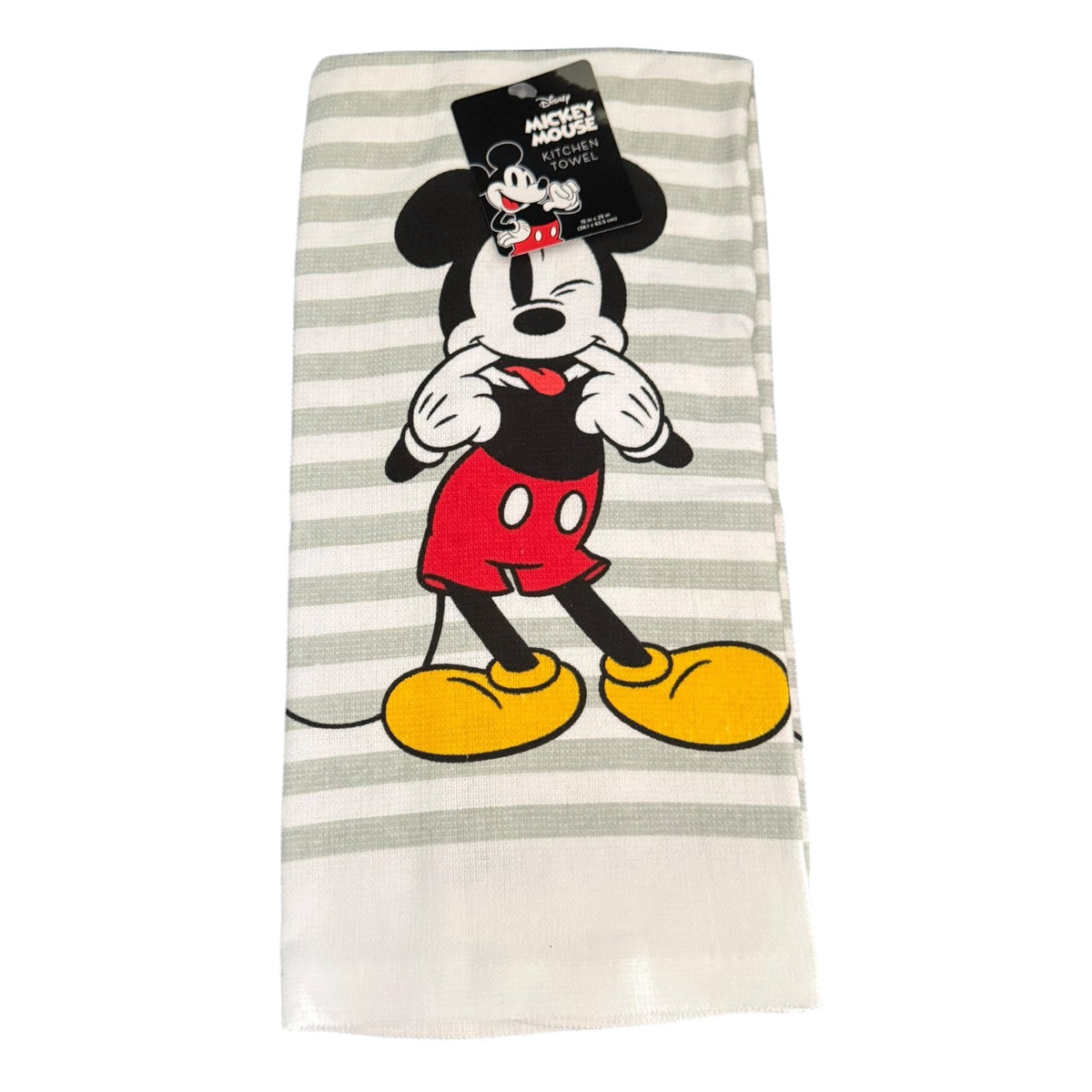 A Mickey Mouse kitchen towel with a white and light gray striped pattern, featuring a graphic of Mickey Mouse in his classic red shorts and yellow shoes. The towel has a black hangtag attached at the top.