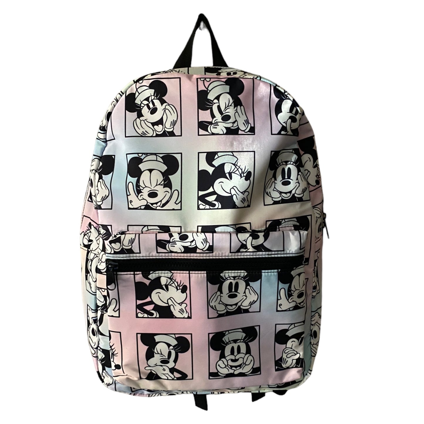 A backpack featuring a repeating cartoon character print in black, white, and pastel pink and light blue panels, shown against a plain white background.