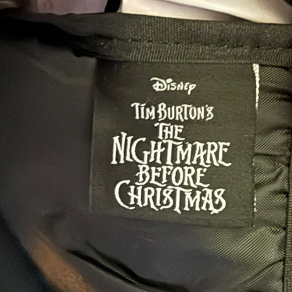 Label for 'Tim Burton's The Nightmare Before Christmas' on a product.