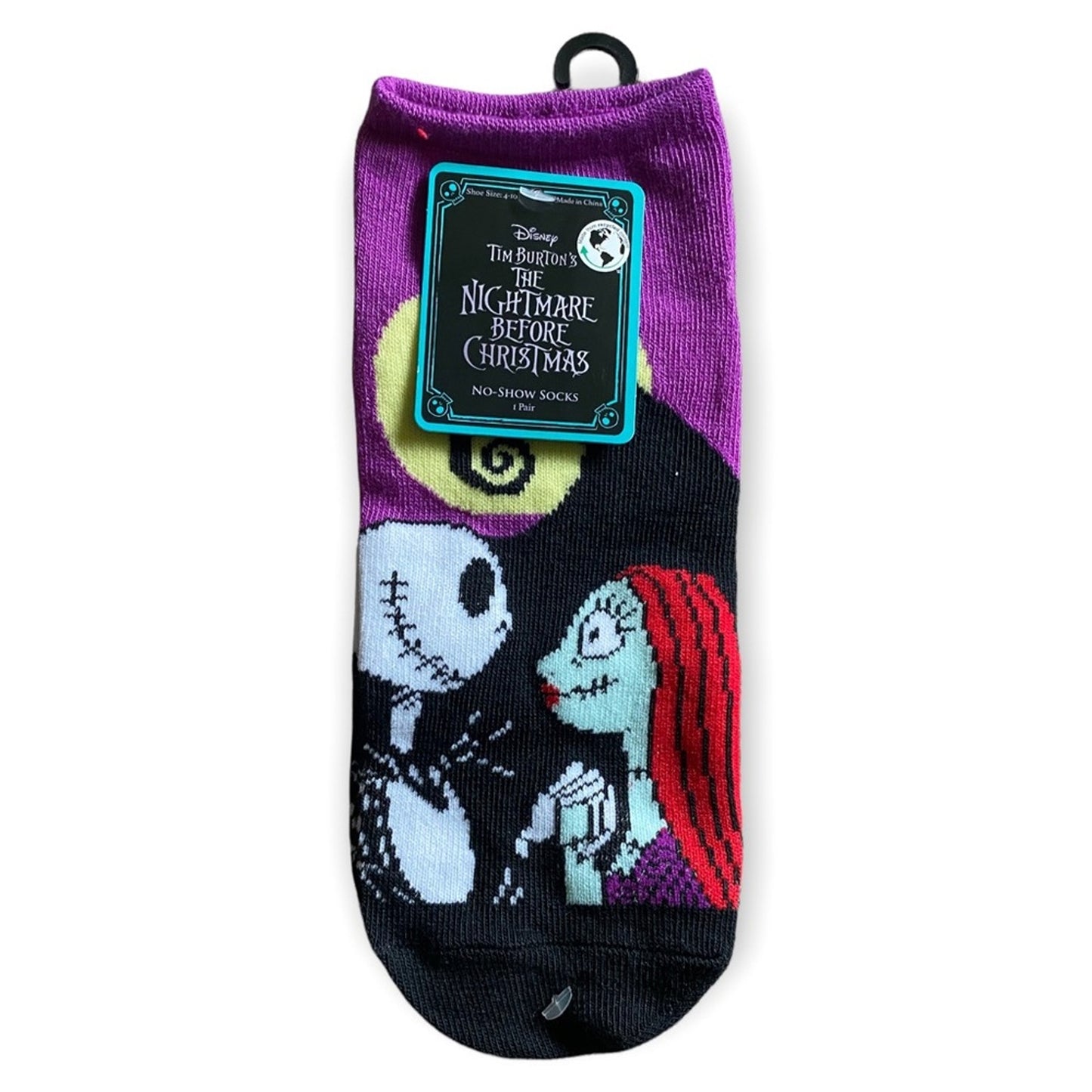 Socks with cartoon characters and 'Nightmare Before Christmas' branding on a white background