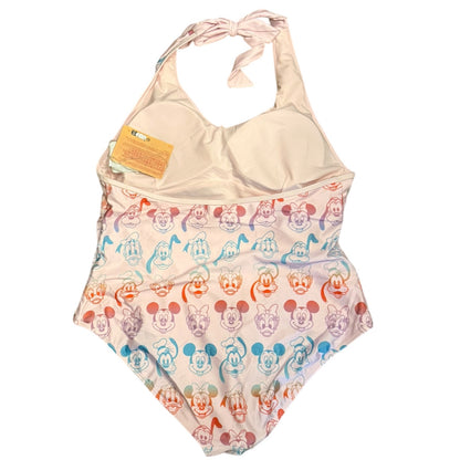 A one-piece halter swimsuit featuring a solid light pink covered in a colorful repeating pattern of cartoon mouse faces, shown on a plain white background with a yellow tag attached.