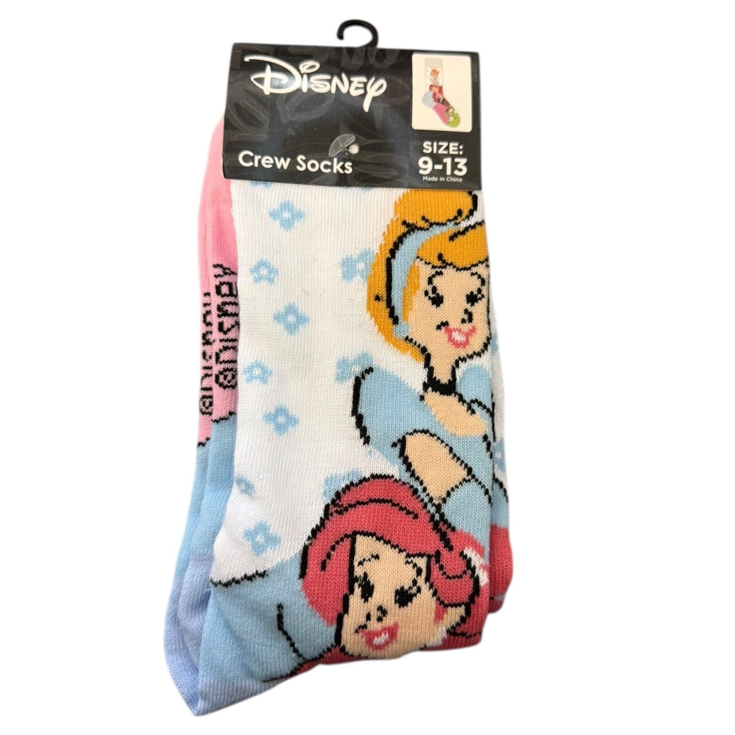 Pack of Disney princess-themed crew socks with packaging on a white background