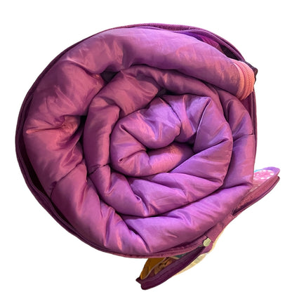 Purple sleeping bag rolled up in a bag on a white background