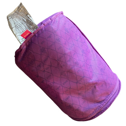 Purple mesh bag with a tags on a white background