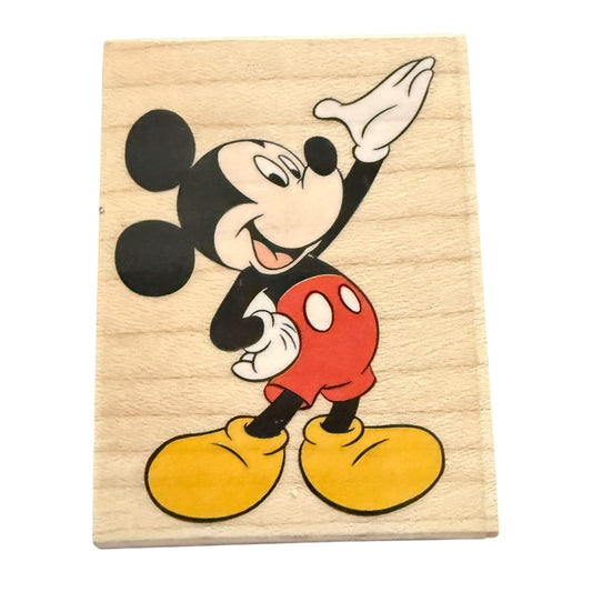 Wooden stamp with a cartoon character on a white background