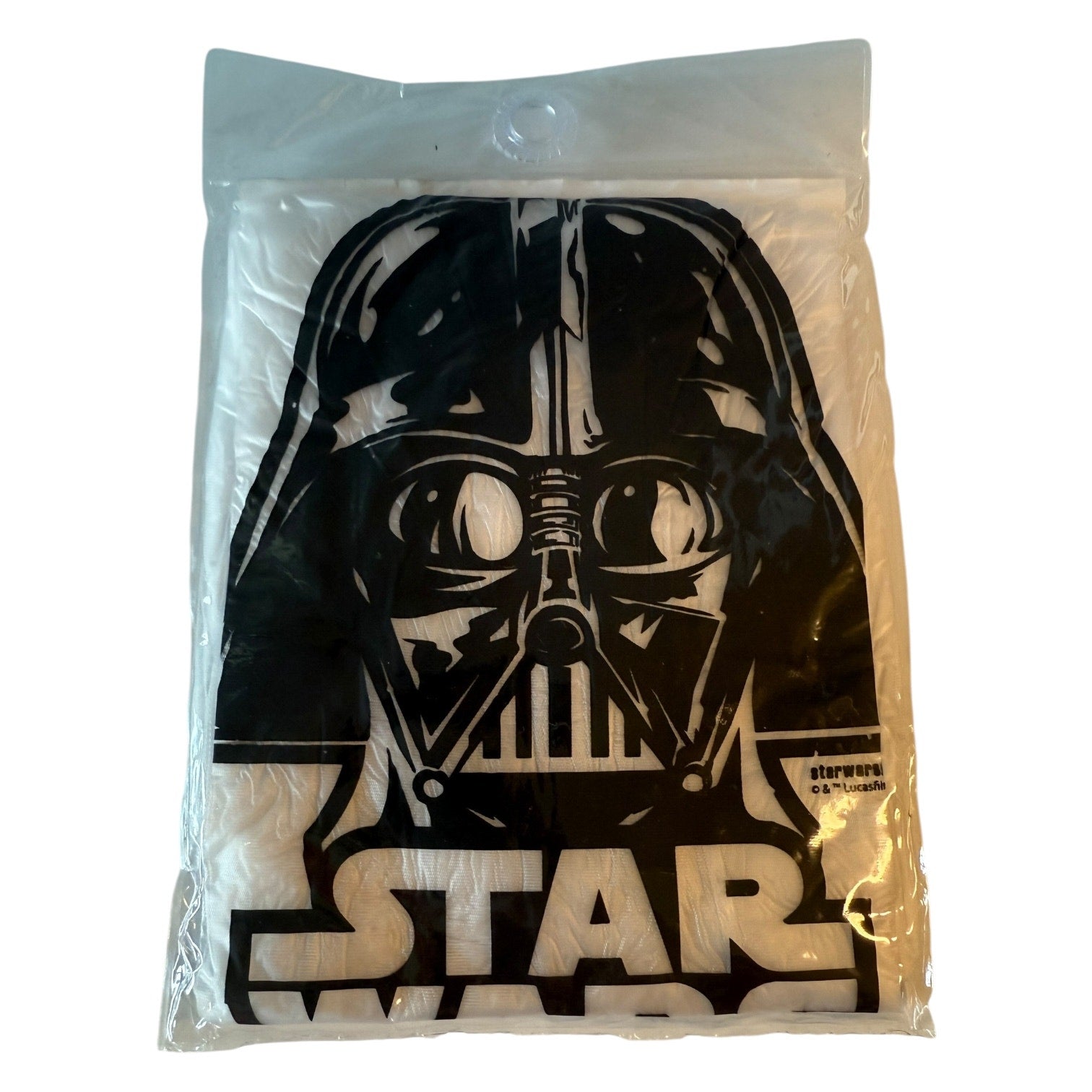 Poncho Packaged with Darth Vader design and 'Star' text on a white background