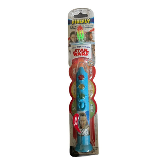 Star Wars Firefly Great Time toothbrush with a blue handle and colorful buttons, packaged in its original retail blister card.