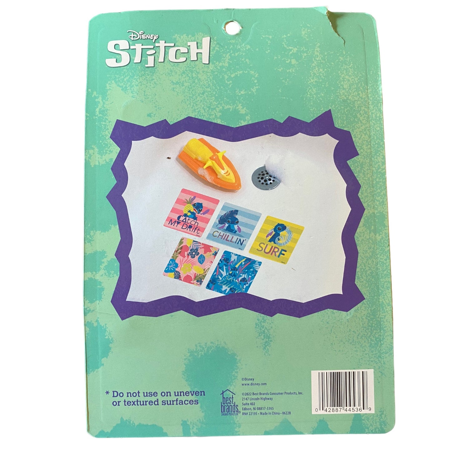 Packaged Disney Stitch product with colorful designs on a green background