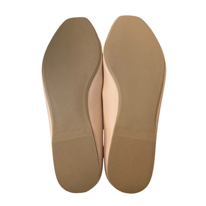 Pair of blush shoe insoles on a white background