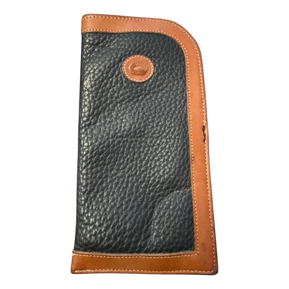 Front of Black leather eye case with brown trim on a white background