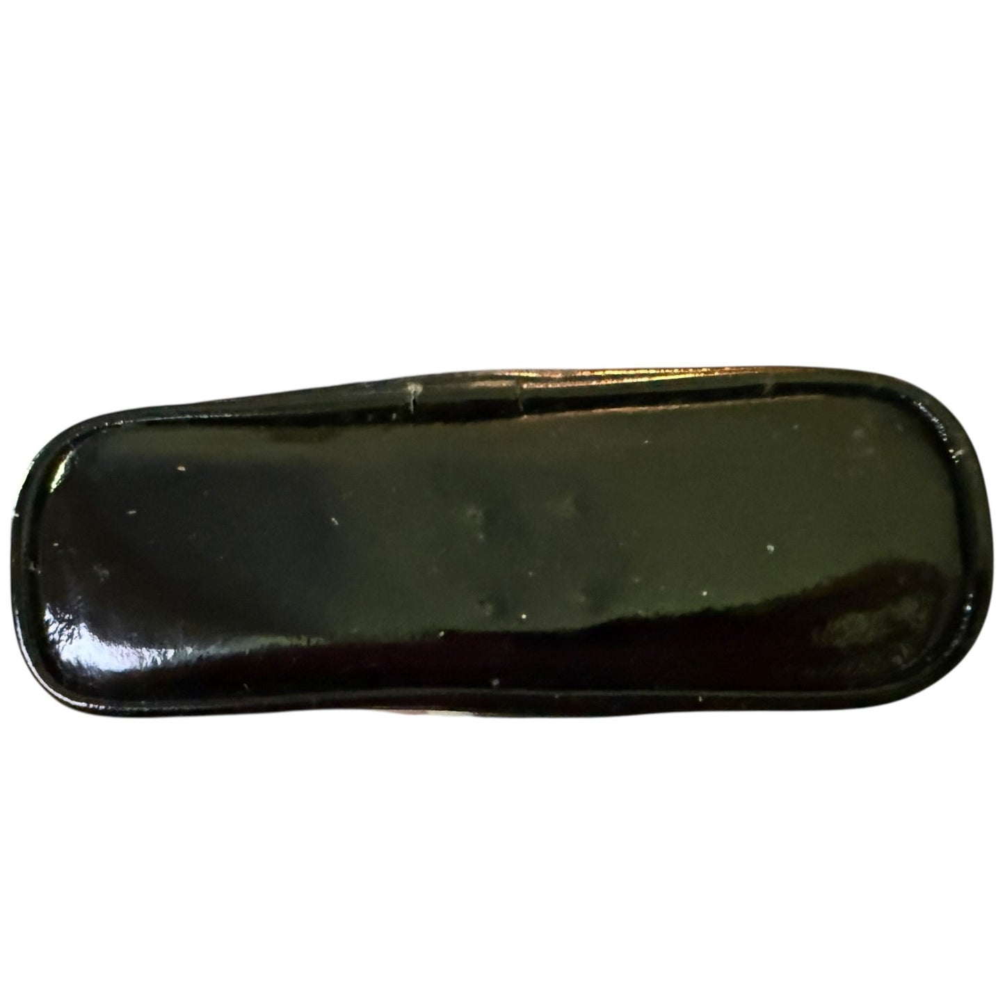 Bottom of black pouch on a white background