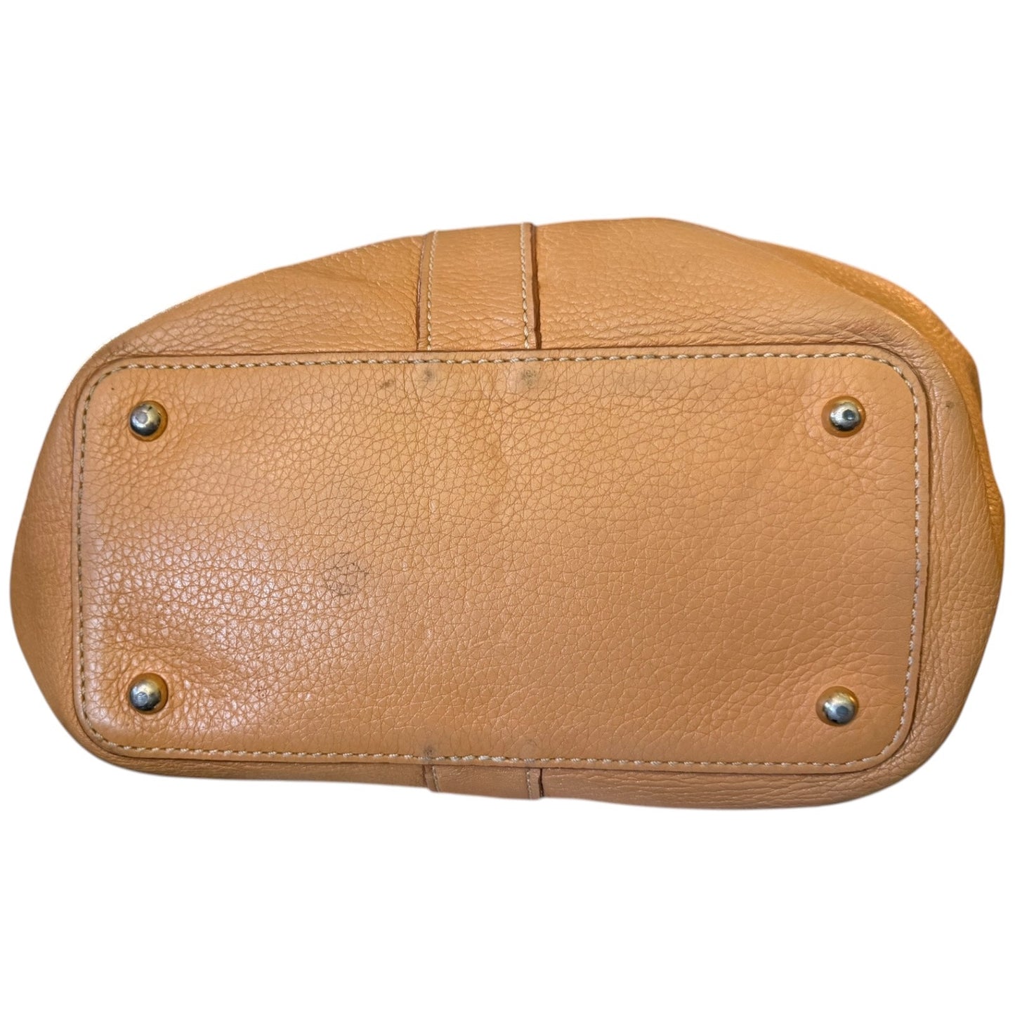 Brown leather handbag with gold studs on a white background