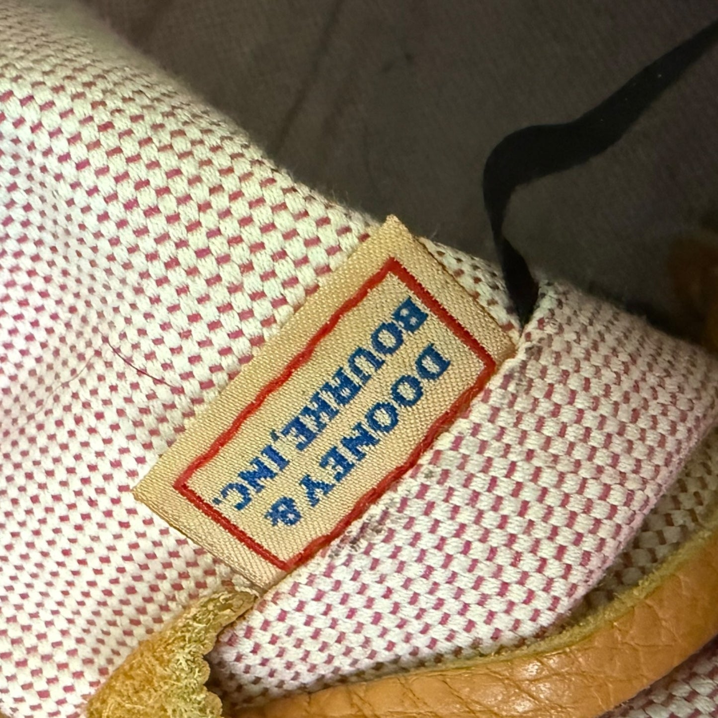 Close-up of a label on a textured surface