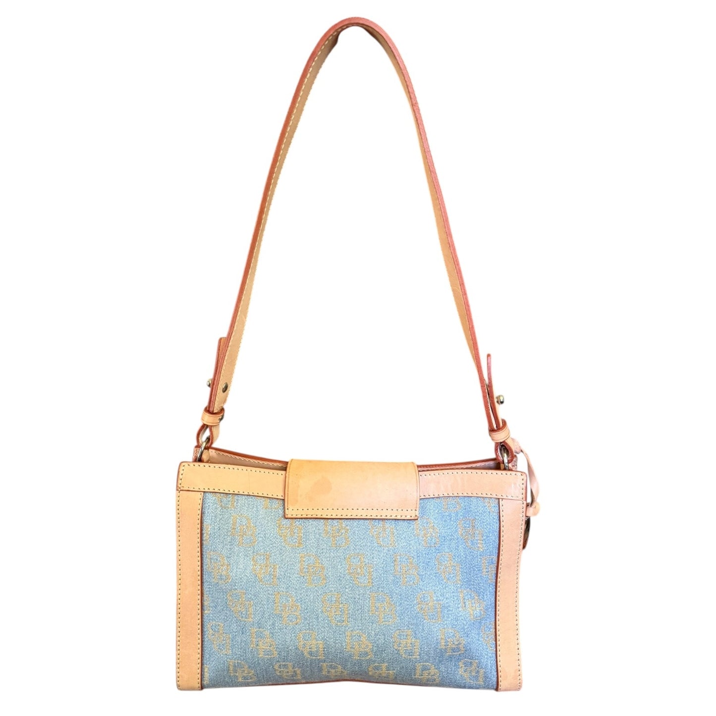 Handbag with blue patterned body and leather accents on a white background