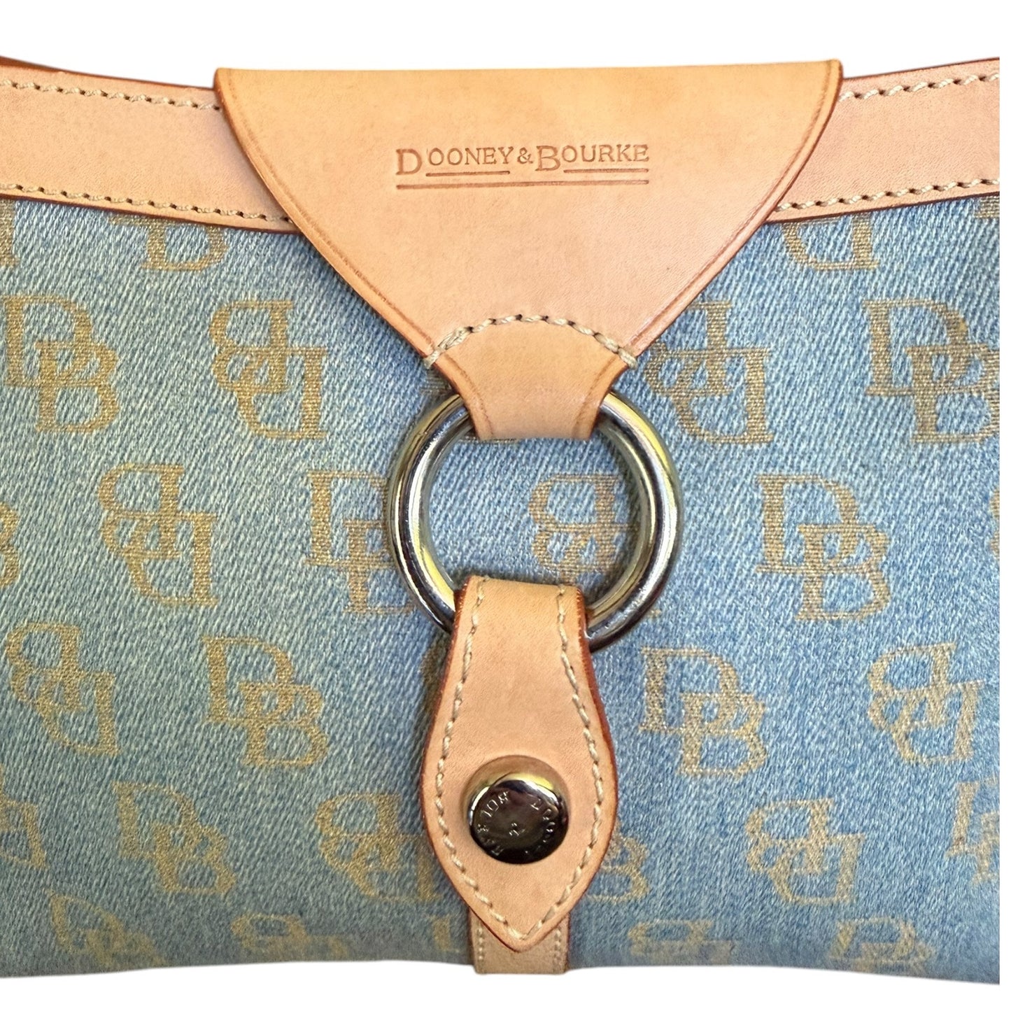 Dooney & Bourke bag with logo pattern and leather accents