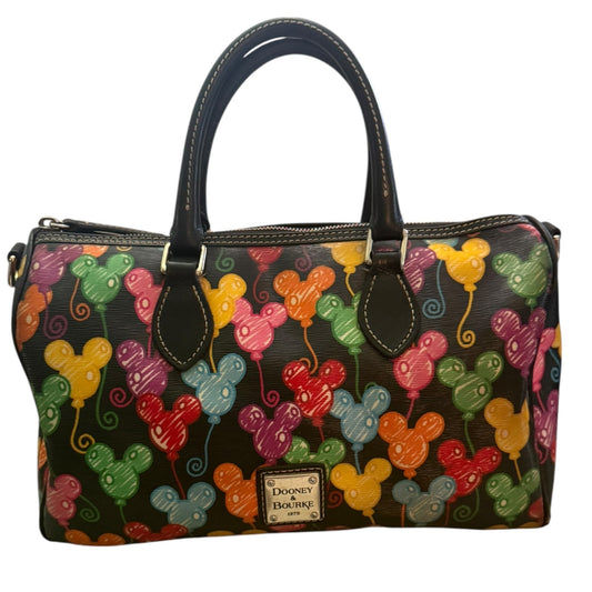 Handbag with colorful balloon design on a black background, featuring the Dooney & Bourke brand.