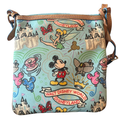 Back of Dooney & Bourke Purse with Disney on a white background