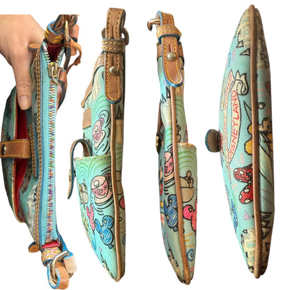 Side views of a Colorful handbag with cartoon designs on a white background