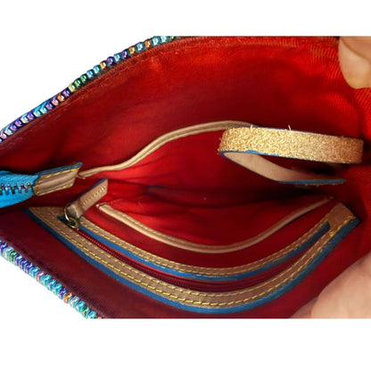 Red interior of bag with blue accents on a white background