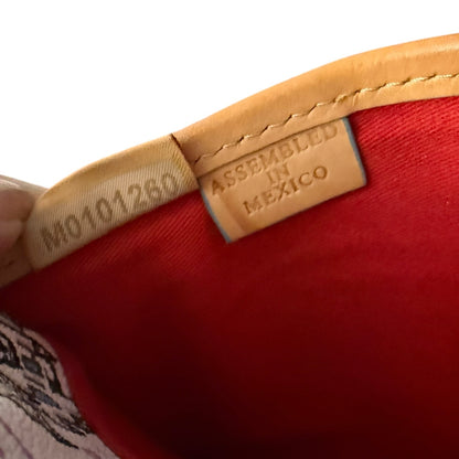 Close-up of a red interior with a label indicating 'Assembled in Mexico'.