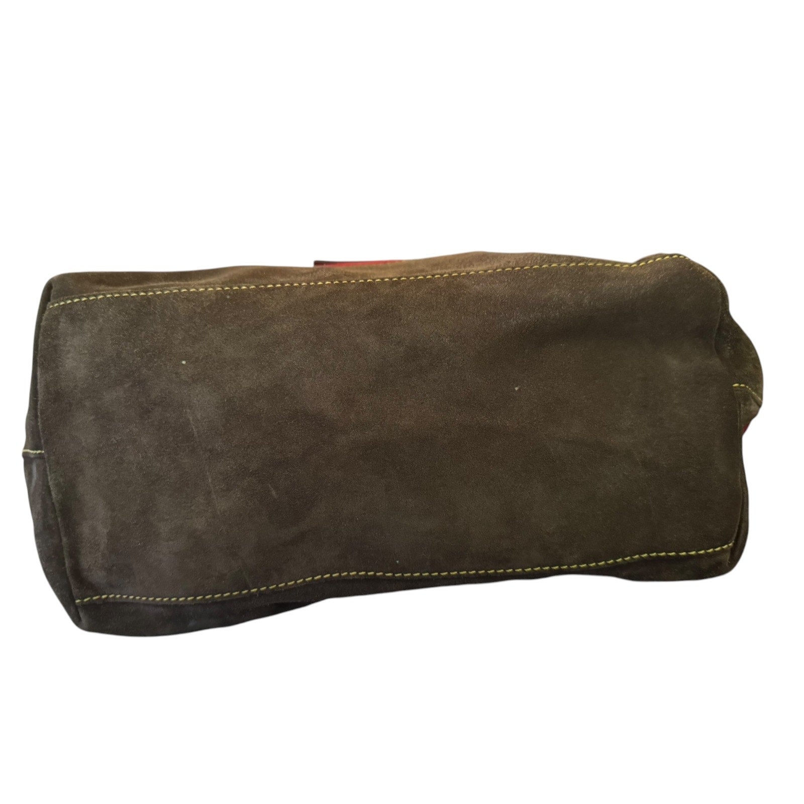 Brown suede bag bottom on a white background