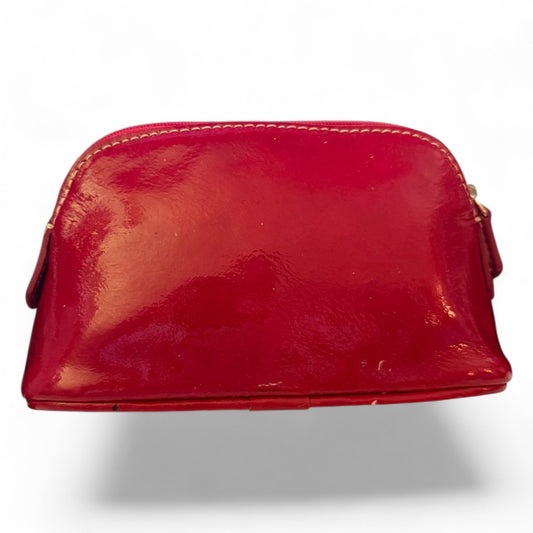 Red leather pouch on a white background
