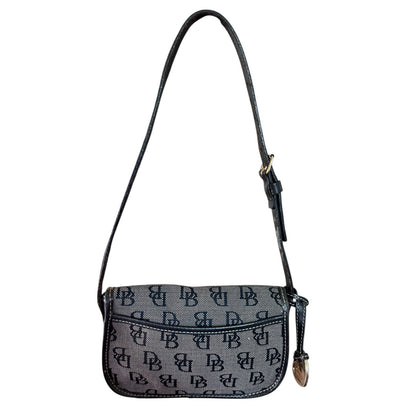 Back of gray handbag with black pattern on a white background