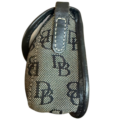 Side of Black and white patterned purse with 'DB' branding on a white background