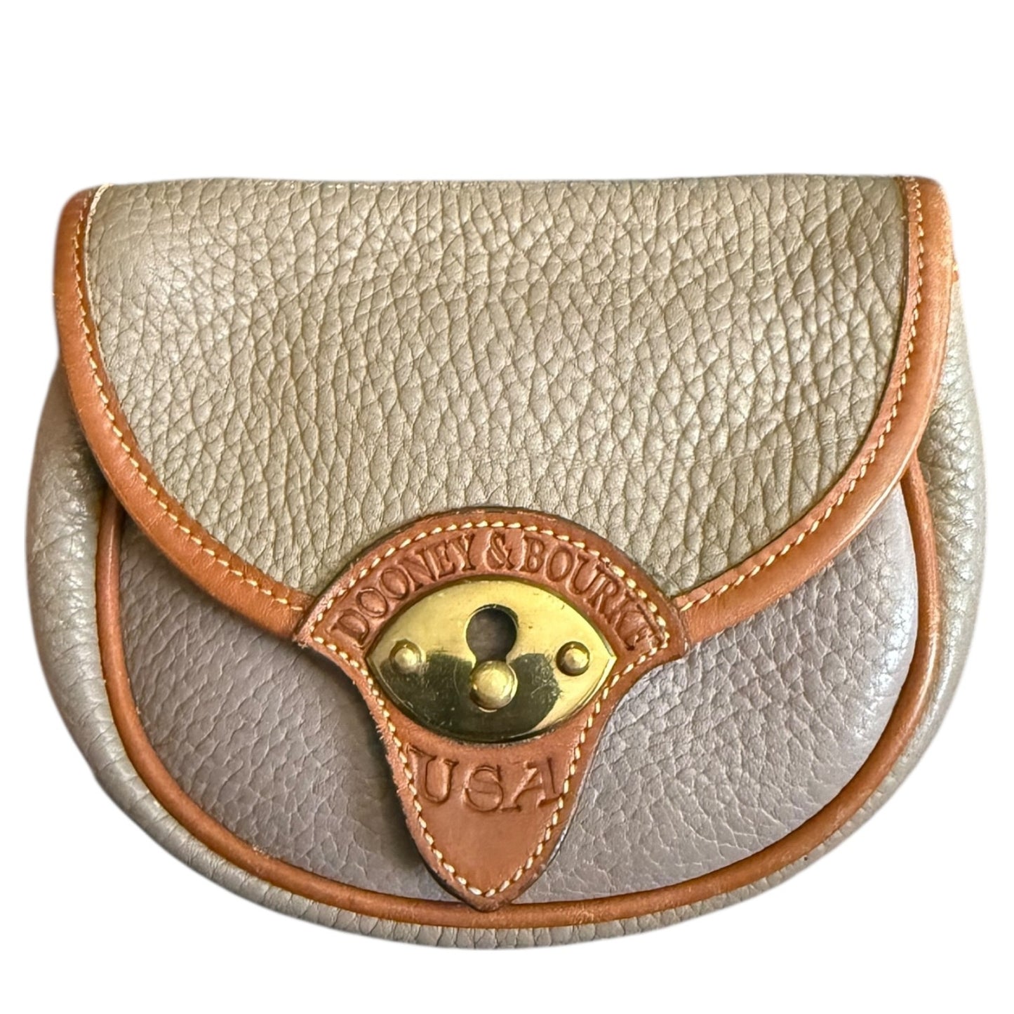 Small leather pouch with gold emblem and 'USA' text on a white background