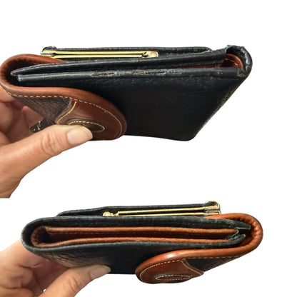 Two views of a black and brown leather wallet held by a hand on a white background.