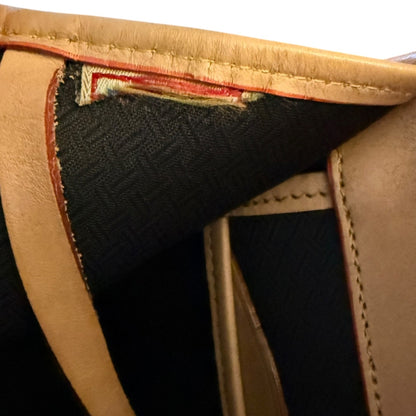 Interior of purse showing cut out label