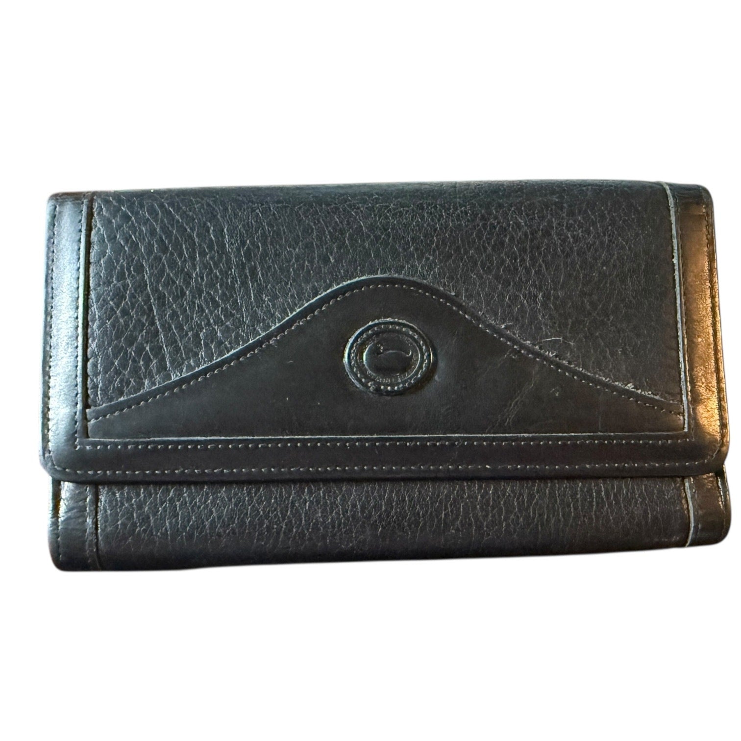 Front of Black leather wallet with a central button on a white background