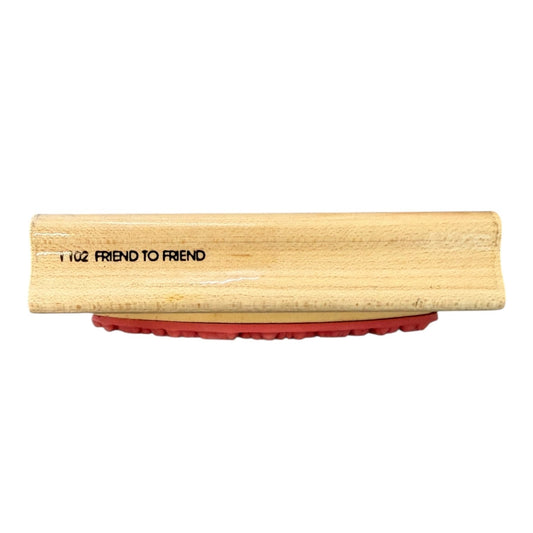 Wooden block with red rubber side and 'FRIEND TO FRIEND' branding on a white background
