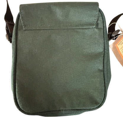 Back of Green shoulder bag with a strap on a white background
