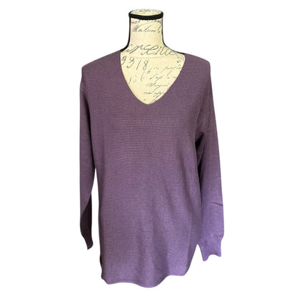 Front of Purple sweater on a mannequin with a white background