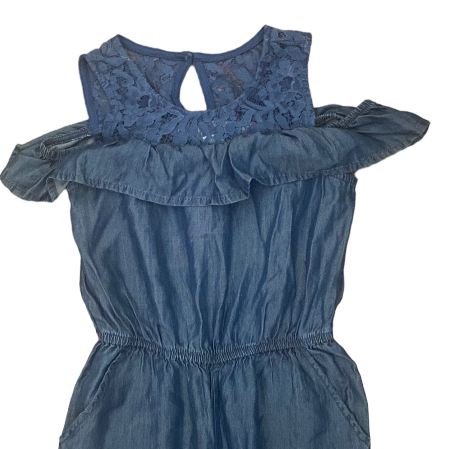 Blue denim jumper front top with lace detailing on a white background