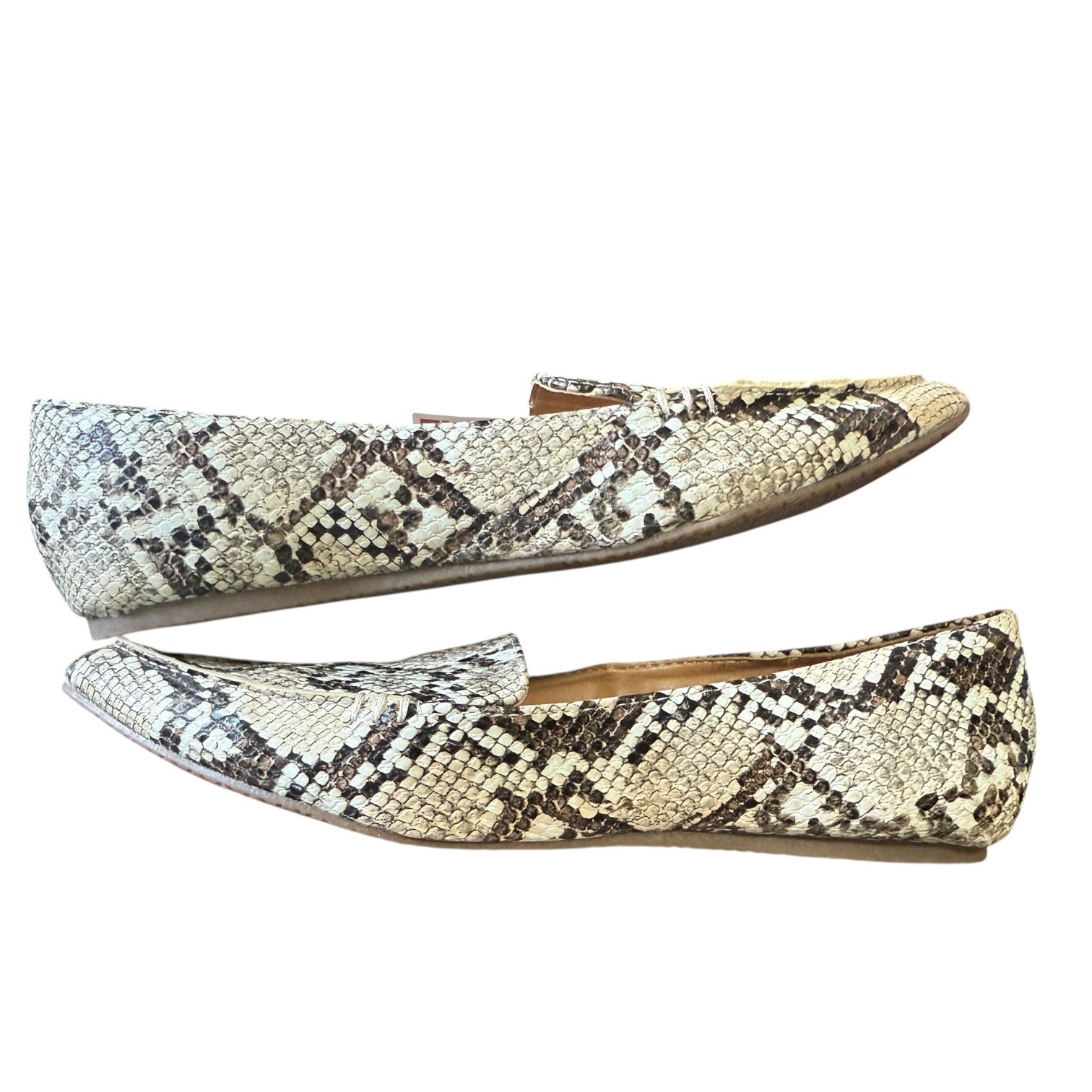 Pair of snake print flats on a white background
