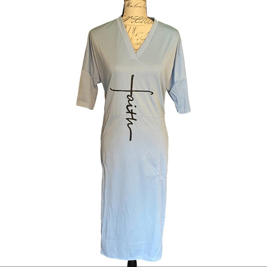 Front of Light blue dress with 'faith' print on a mannequin against a white background