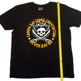 Black t-shirt with a skull and swords design and text, measured by a yellow tape measure.