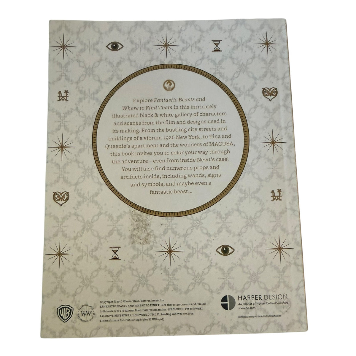 The back cover of the Harper Design coloring book,  a central brown circular text block, and various occult-style symbols.