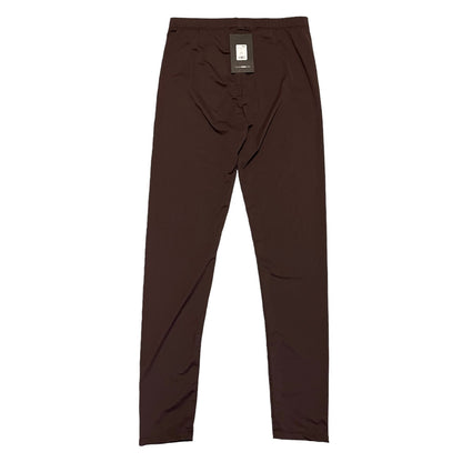 Back of Brown pants with a tag on a white background