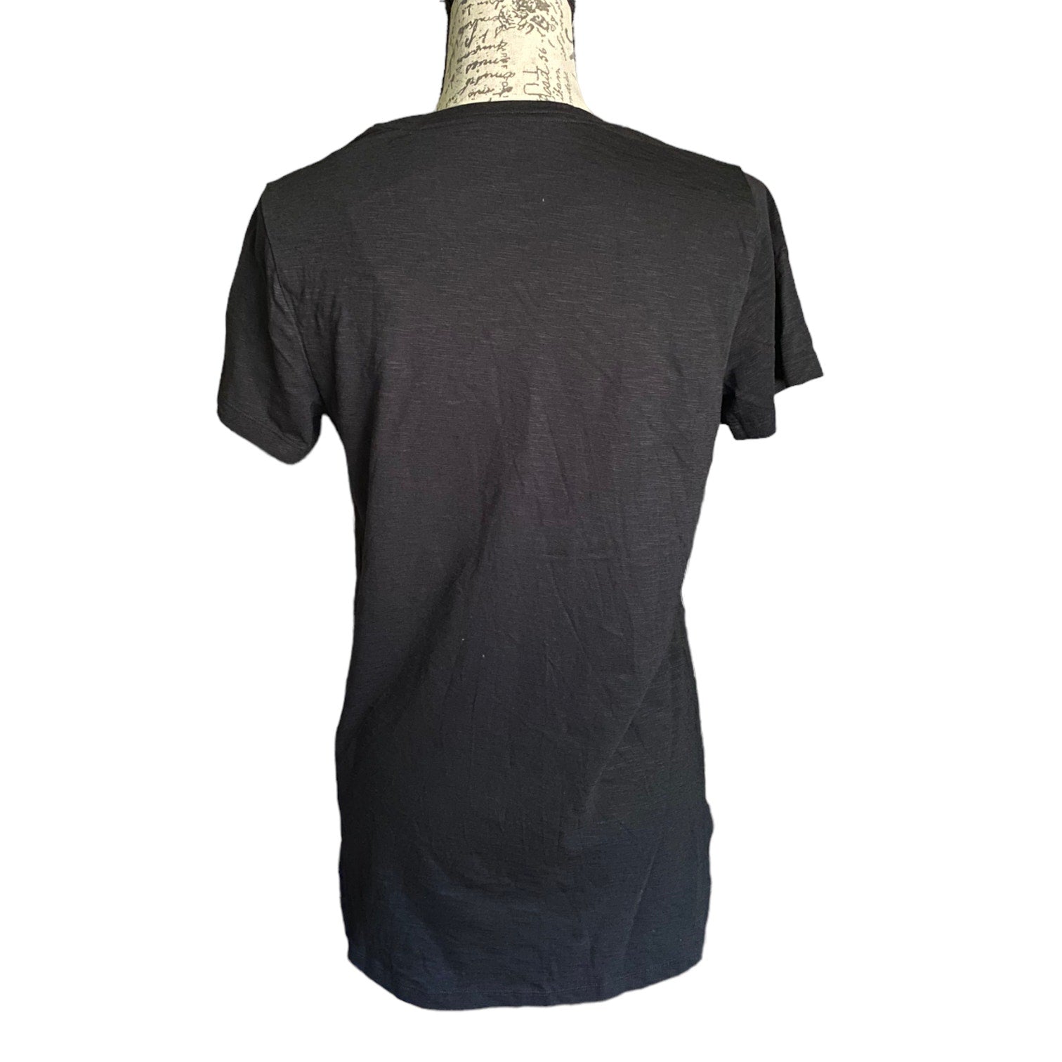 Back of Black t-shirt on a mannequin with a white background