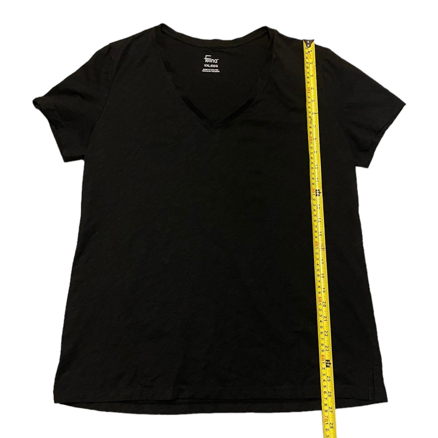 Black t-shirt with a measuring tape on a white background