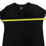 Pit to pit on black shirt