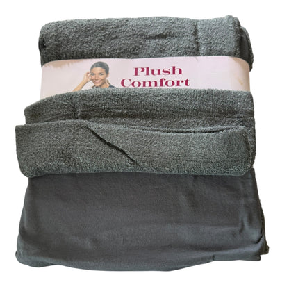 Folded gray pajama set with 'Plush Comfort' label on a white background