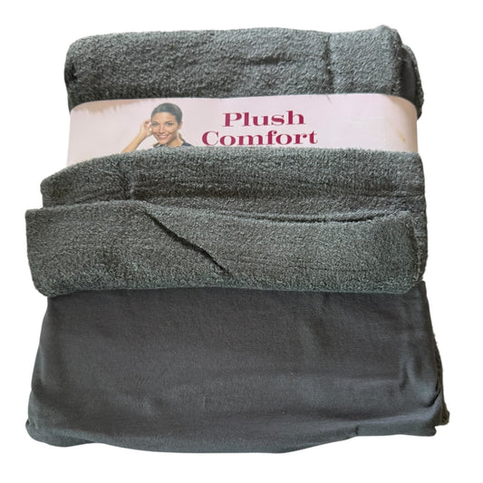 Folded gray pajama set with 'Plush Comfort' label on a white background